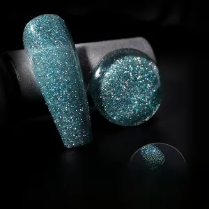 Macro shot of disco gel polish in blue-green glitter shade 006 with high diamond shine