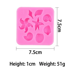 Pink silicone mold with starfish and seashell shapes for fondant or resin 7.5cm size