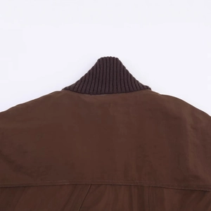Deep brown loose-fit ribbed sleeve jacket featuring a knitted rib collar detail