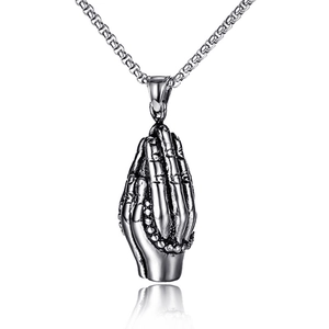 Vintage stainless steel prayer hands pendant necklace with silver chain on white background