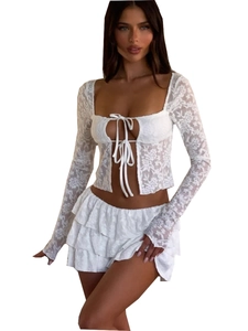 Elegant white lace two-piece set featuring long sleeve tie-front crop top and tiered skirt
