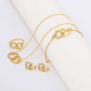 Elegantes goldenes Doppelherz-Schmuckset mit Kette Armband Ohrringen und Ring