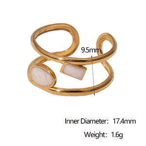 Detail showing 18k gold plated double-layer open ring with geometric white enamel accents