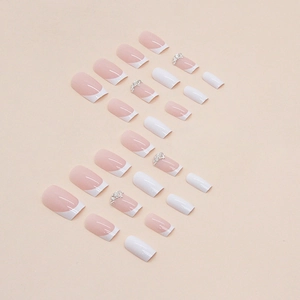 French tip medium square press-on nails in cream white with pearls and rhinestones