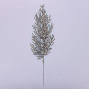 Detailed view of artificial silver glitter pine branch for Christmas tree decoration