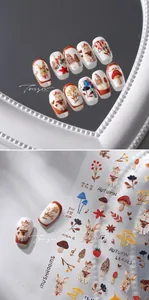 Close-up of 5D autumn nail stickers featuring hand-painted rabbits, mushrooms and leaves