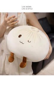 Detail of plush bun pillow with cute embroidered face and soft micro-plush texture