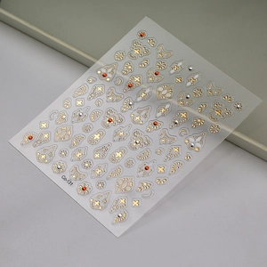 3D golden mandala nail stickers with orange rhinestones and floral geometric patterns