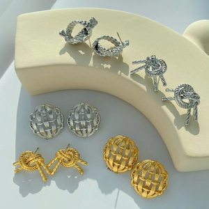 Set of 5 pairs of gold and silver knot and hollow woven earrings in stainless steel