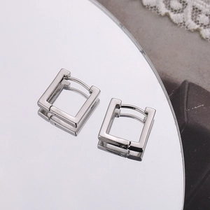 Minimalist square geometric silver earrings with a high-polished mirror finish