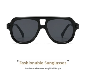 Front view of double-bridge aviator sunglasses with thick black frames and grey lenses