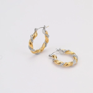 Detail of two-tone twisted rope hoop earrings with 18k gold and silver plating