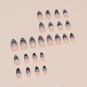 Starry sky themed press-on nails with celestial patterns and ombre gradient finish