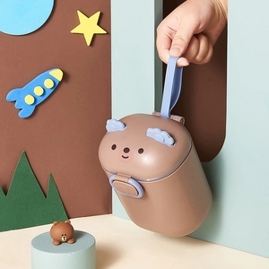 Portable cartoon bear milk powder storage box with handle in brown and blue colors