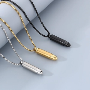 Three minimalist bullet pendants in silver, gold, and black finish on sturdy box chains