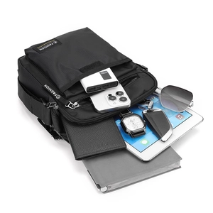 Men's black nylon crossbody bag with large capacity showing tablet and daily essentials