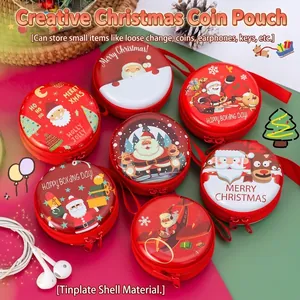 Christmas round tinplate coin purse for kids featuring Santa and reindeer holiday designs