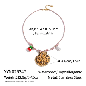 Bohemian woven cord necklace with shell pendant and pearl details plus dimensions