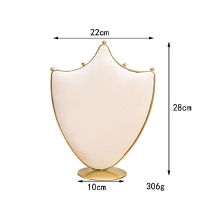 Shield jewelry display stand with white velvet and gold frame, 28cm height dimensions