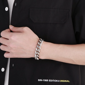 Polished silver stainless steel Cuban link bracelet for men with a hip-hop aesthetic