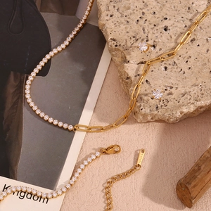 Detail of 18K gold plated stainless steel necklace set with zircon studs on stone