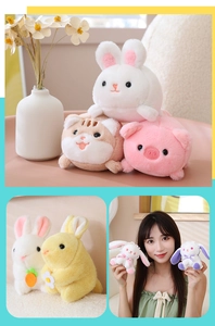 Detailed view of colorful plush pull-string animal toys in bunny, cat and pig designs