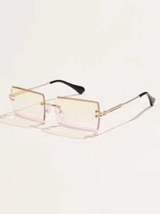 Detail of rimless square sunglasses with yellow-pink gradient lenses and gold metal temples