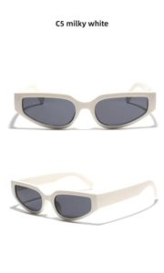 Detail view of milky white cat-eye sunglasses featuring C5 color and sleek gray lenses