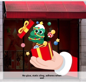 Detail of Christmas tree and Santa stickers featuring glue-free static cling technology