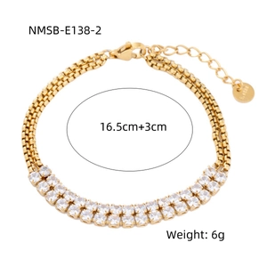 Detail of 18K gold plated steel bracelet featuring double rows of white zircon stones