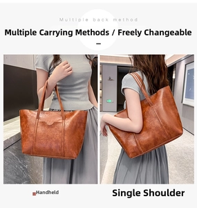 Detail view of retro oil wax leather tote bag shown in handheld and shoulder carry styles