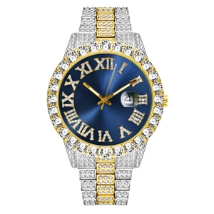 Close-up of gold-silver tone diamond watch featuring blue dial and Roman numerals