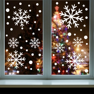 Close-up of white snowflake static window stickers for Christmas festive home decoration