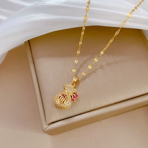Golden titanium steel necklace with fortune pouch pendant and micro-set diamonds