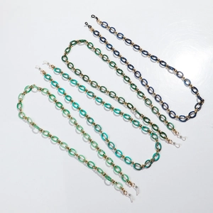 Bohemian acrylic eyeglass chains in deep blue and green colors with gold metal hooks