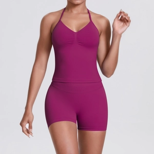 Halter top and high-waisted shorts yoga set in vibrant fuchsia for fitness and sports