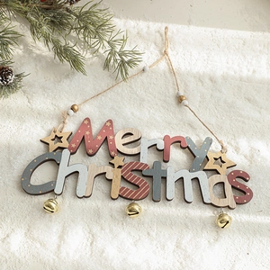 Wooden Merry Christmas hanging sign with golden bells on festive snowy background