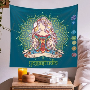Cozy room detail with yoga studio wall tapestry featuring chakras and mandala art