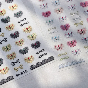 Golden Korean bow and butterfly embossed nail stickers M-915 with glitter detailing
