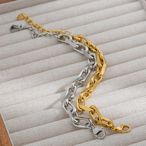 Chunky 18K gold and silver stainless steel Cuban link bracelets with lobster clasp and heart charm