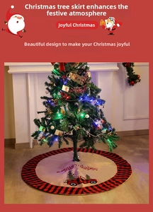 Detail of burlap Christmas tree skirt with buffalo plaid truck and embroidery