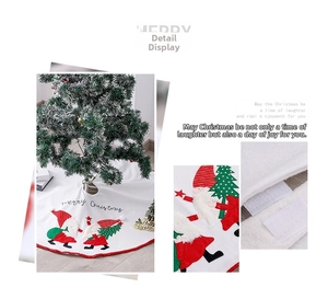 Detail of Christmas tree skirt with gnome embroidery and Velcro closure for decor