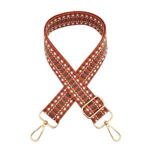 Colorful woven jacquard wide shoulder strap with orange geometric patterns and gold clips
