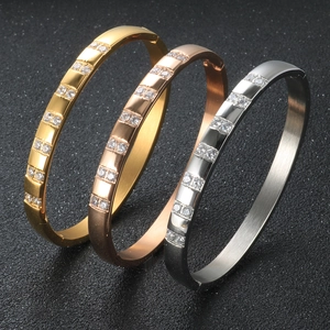 Bracciali in acciaio lucido in oro, oro rosa e argento con diamanti incastonati