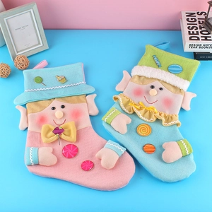 Creative Christmas stockings with cute elf designs for festive tree hanging and gift bags