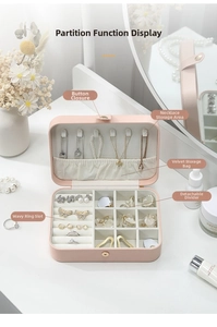 Pink jewelry box details showing necklace hooks, ring slots and velvet dividers