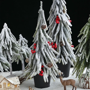 Mini PE flocked Christmas trees with snow, pine cones, and red berries in black pots