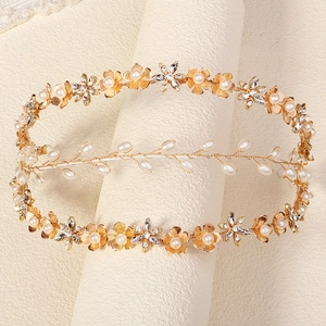 Detailed view of handmade baroque gold flower headband with rhinestones and pearls