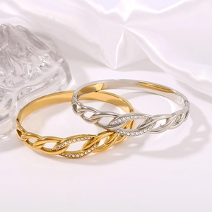 Elegant gold and silver twisted rope bangles with micro-paved cubic zirconia on silk