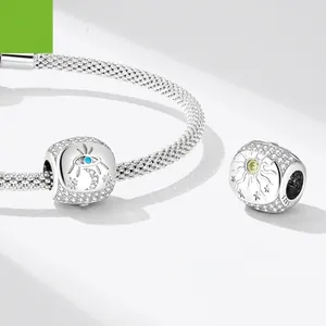 S925 sterling silver mesh bracelet featuring celestial sun and moon charms with blue stones